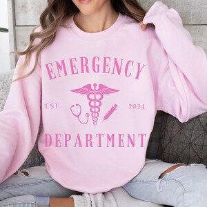 Custom Emergency Department Graphic Sweatshirt, Personalized ER Nurse Sweater, ED Crewneck Shirt, Gift for ER Tech, Er Room Doctor Staff Light Pink