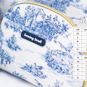 May include: White and blue toiletry bags with a gold zipper. The bags feature a classic toile pattern and the text "Sewing Stroll". The size chart shows measurements in inches and centimeters.