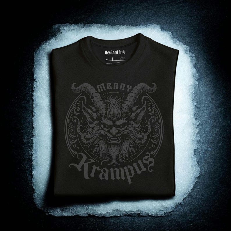 Traditional Gothic Etched Art inspired design depicting the Krampus with typography MERRY KRAMPUS. this design is printed in dark in directly onto the fabric, giving a blackout effect and lasting print. soft, comfortable, Unisex T Shirt.