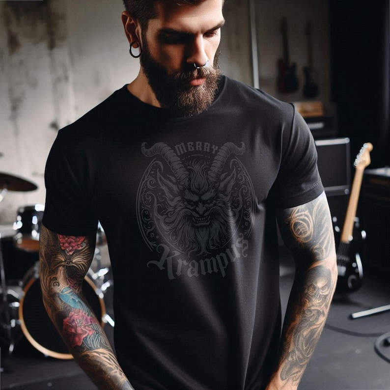 May include: Black t-shirt with a graphic of a horned creature with the text "Merry Krampus".