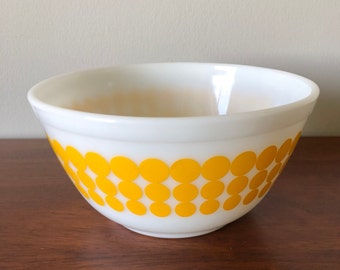 POLKA DOT PYREX - Nothing says 1960s better than a yellow polka-dot Pyrex bowl!