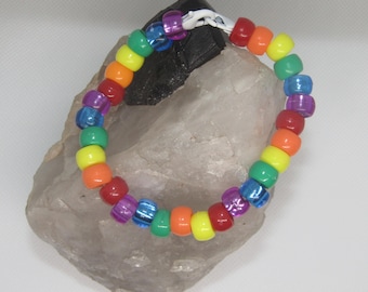 Pulsera Kandi Arcoíris: Joyas para festivales rave con cierres de langosta