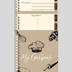 May include: A spiral-bound cookbook with a tan cover featuring illustrations of baking tools and pastries. The cover reads "My Cookbook" in a handwritten font. Inside, there are recipe and ingredient pages.