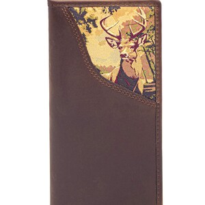 May include: Brown leather wallet with a decorative panel featuring a deer in a forest scene. The wallet is rectangular and has a bi-fold design. The deer is depicted with antlers, and the forest scene includes trees and foliage.