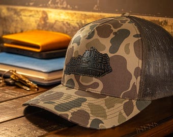 Kentucky Map Old School Camo Trucker Hat. Burnished Full Grain Leather Patch. 5-Panel Richardson 112 Snapback Cap. Stitched Map Patch.