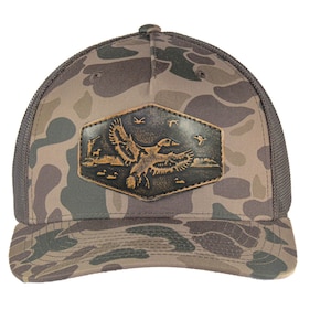 Mallard Old School Camo Trucker Hat. Hand Burnished Full Grain Leather Patch. 5-Panel Richardson 112 Snapback Cap. Stitched Duck Patch.