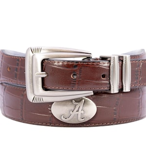 May include: A brown leather belt with a silver buckle featuring the letter "A". The belt has a crocodile-embossed pattern.