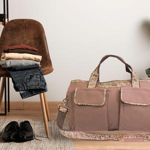 Shot Shell old school camo canvas weekender bag brown tan chair