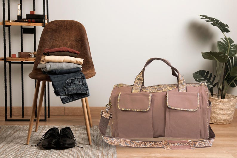 Shot Shell old school camo canvas weekender bag brown tan chair