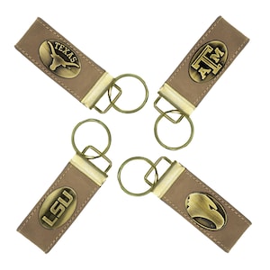 Collegiate Leather Key Fob. Crazyhorse Full Grain Leather With Antique Brass Logo. Texas Longhorns, TAM Aggies, Georgia Southern, LSU Tigers