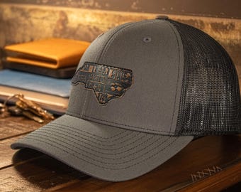 North Carolina Map Leather Patch Trucker Hat. Burnished Full Grain Leather. Snapback Trucker Hat. Richardson 112 Cap. NC Headwear.