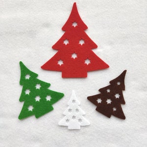 Peut inclure: Quatre décorations de sapin de Noël en feutre rouge, vert, blanc et marron. Chaque arbre a un motif découpé en forme d'étoile.