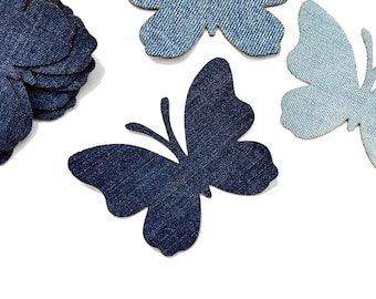 Fjärilsutskärningar i denim, applikationer av återvunnet tyg för gör-det-själv-pyssel