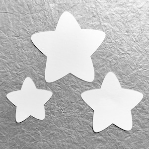 Papier cartonné étoiles découpées étoiles blanches découpées travaux manuels en papier Décoration d'intérieur Baptême Décoration de chambre de bébé Décorations de baby shower Marque-places de mariage