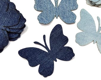 Applikationer av fjärilar i denim, utklippta tyger av återvunnet material för hantverk