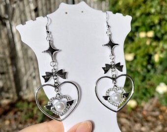 Boucles d'oreilles pendantes argentées coquette arc, coeur, ailes d'ange, perle, étoile