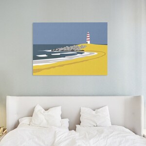 May include: A minimalist illustration of a red and white lighthouse on a yellow sandy beach with blue water and gray rocks.