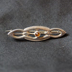 Vintage silver bar brooch with purple stone