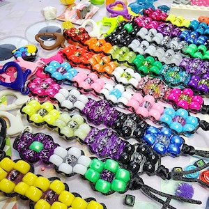 pride flower roller fidget keychains **your choice of 1**