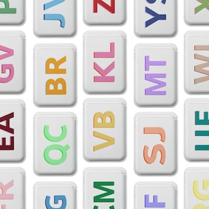 May include: A grid of twenty-five white rectangular tiles with rounded corners, each featuring two capital letters in various colors. The letters are in a sans-serif font. The tiles have a stitched border.