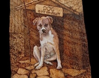 Custom-made, wood-burned wall hanging of your furry friends