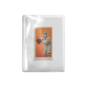 May include: Vintage baseball card featuring a player in a light-colored uniform, cap, and dark glove, set against an orange background. The card is encased in a clear protective sleeve. Text at the bottom reads "Chance, Ch. Chicago Nat'l."