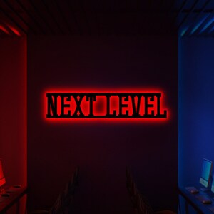May include: A dark room with red and blue lighting. The room has rows of computer monitors and gaming chairs. A red neon sign reads "NEXT LEVEL".