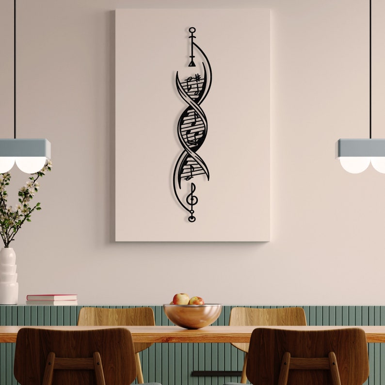 May include: Black metal wall art featuring a double helix design with musical notes incorporated into the structure. The art piece is hanging on a light beige wall in a dining room setting.