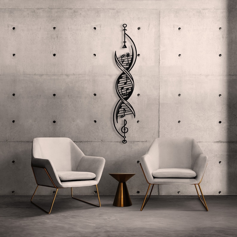 May include: A black metal wall sculpture in the shape of a double helix with musical notes and a treble clef. The sculpture is hanging on a gray concrete wall. Two white chairs with gold frames are in front of the sculpture, and a small gold side table is between the chairs.