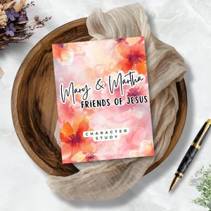 May include: A printable character study guide with a watercolor background featuring pink and orange flowers. The text reads "Mary & Martha Friends of Jesus Character Study" with a website address at the bottom.
