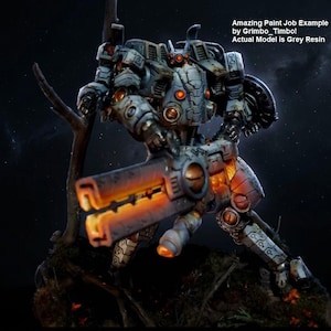 May include: A grey resin robot model featuring intricate mechanical plating, glowing orange circular accents, and a large weapon with a bright orange barrel. Text reads: Amazing Paint Job Example by Grimbo_Timbo! Actual Model is Grey Resin.