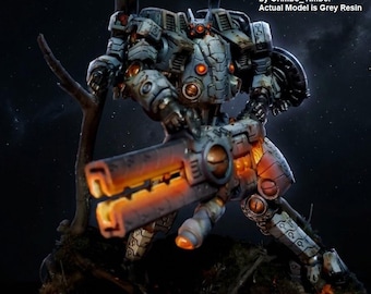 Op de afbeelding: Een robotmodel van grijze hars met ingewikkelde mechanische beplating, gloeiende oranje ronde accenten en een groot wapen met een feloranje loop. Tekst: Amazing Paint Job Example by Grimbo_Timbo! Actual Model is Grey Resin.