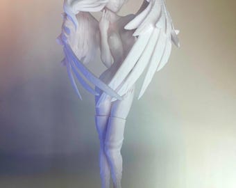 May include: A white 3D printed figurine of an angel with long flowing hair and large wings. The angel is standing on a white base.