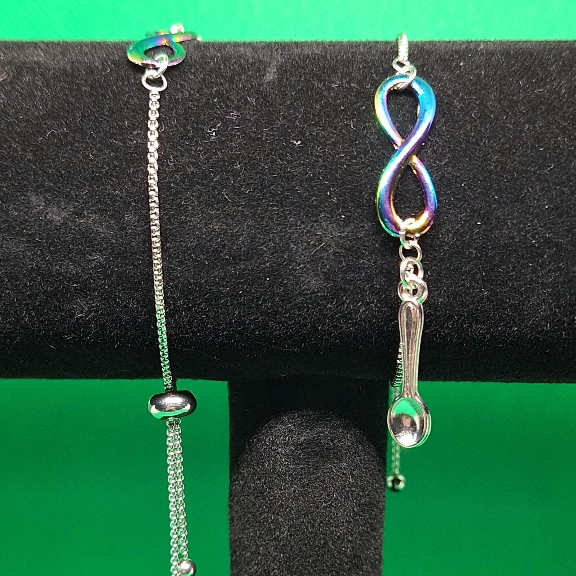 Bracciale elastico con figura di ginnasta e farfalla in strass Bracciale elastico con figura di ginnasta e farfalla in strass