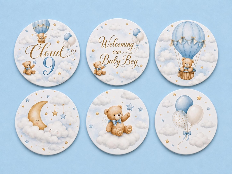May include: Six circular coasters featuring illustrations of teddy bears, hot air balloons, clouds, and stars in shades of blue, white, and gold. One coaster displays the text Cloud 9, and another displays the text Welcoming our Baby Boy.