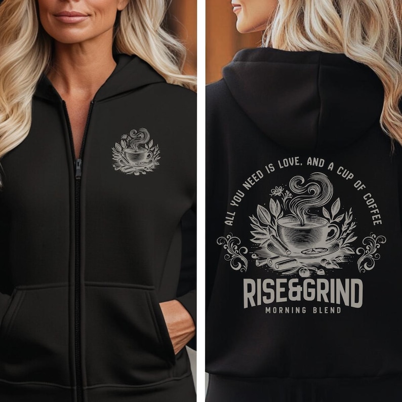 May include: Black zip-up hoodie with a coffee cup design on the front and back. The front features a cup of coffee with steam, while the back displays the text "ALL YOU NEED IS LOVE, AND A CUP OF COFFEE" and "RISE&GRIND MORNING BLEND".