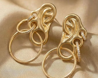 Surrealist bijoux anatomy earrings, vintage 18k gold chandelier earrings, luxury festival earrings