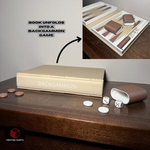 May include: A beige backgammon set with the word "BACKGAMMON" printed on the front. The set includes brown dice cups, dice, and game pieces. The text "BOOK UNFOLDS INTO A BACKGAMMON GAME" is also visible.