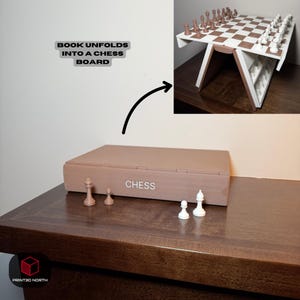 May include: A light brown wooden chess set with a folding board. The closed box has the word "CHESS" on it. The chess pieces are white and brown. The text "BOOK UNFOLDS INTO A CHESS BOARD" is also visible.