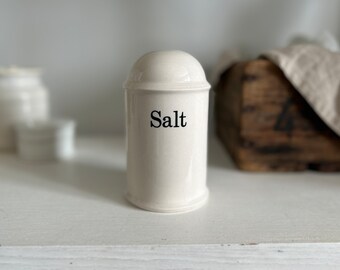 Vintage off-white ceramic salt shaker