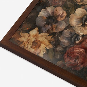 May include: A framed print of a still life painting featuring a bouquet of flowers with eyes painted on the petals. The flowers are in shades of brown, red, purple, and yellow. The background is a dark brown.