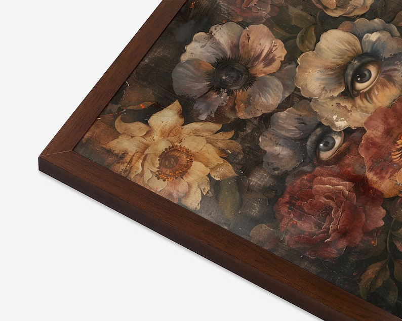 May include: A framed print of a still life painting featuring a bouquet of flowers with eyes painted on the petals. The flowers are in shades of brown, red, purple, and yellow. The background is a dark brown.