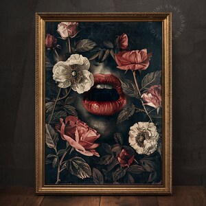 May include: A framed art print featuring a close-up of a woman's lips with a red lipstick, surrounded by a vibrant floral arrangement of pink and white flowers. The background is a dark, textured canvas.