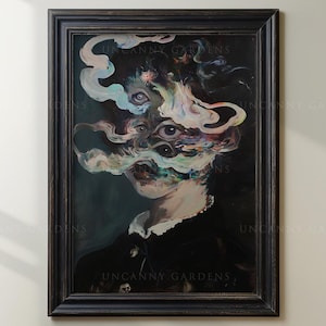 May include: A framed surrealist portrait with a dark, distressed wooden frame. The artwork depicts a figure with multiple eyes and swirling, colorful smoke-like forms obscuring the face. The text "UNCANNY GARDENS" is visible on the frame.