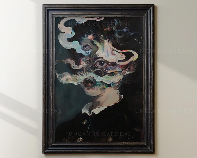 May include: A framed surrealist portrait with a dark, distressed wooden frame. The artwork depicts a figure with multiple eyes and swirling, colorful smoke-like forms obscuring the face. The text "UNCANNY GARDENS" is visible on the frame.