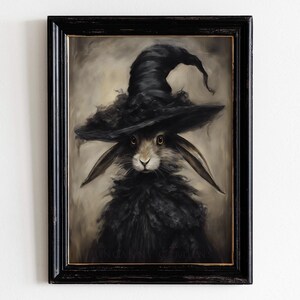 May include: A painting of a rabbit wearing a black witch's hat with a wide brim. The rabbit has brown fur and is looking directly at the viewer. The background is a dark brown.
