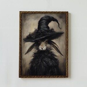 May include: A painting of a rabbit wearing a black witch's hat with a wide brim. The rabbit has black fur and is looking directly at the viewer. The background is a light brown color.