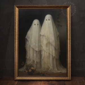 May include: A framed painting of two figures in white, ghostly gowns with lace details. The figures have no visible mouths and their eyes are represented by two black dots. The painting is set against a dark background.