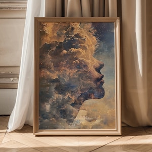 Pu&ograve; includere: Una stampa d'arte astratta incorniciata che presenta il profilo di un viso, con nuvole e cielo che formano i tratti. Lo sfondo &egrave; un mix di toni blu, dorati e marroni.