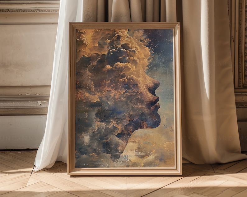 Pu&ograve; includere: Una stampa d'arte astratta incorniciata che presenta il profilo di un viso, con nuvole e cielo che formano i tratti. Lo sfondo &egrave; un mix di toni blu, dorati e marroni.